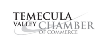 Logo for the Temecula Valley Chamber of Commerce, with "Temecula Valley" in black text and "Chamber of Commerce" in gray, featuring a swoosh design in the background. Logo for the Temecula Valley Chamber of Commerce, with "Temecula Valley" in black text and "Chamber of Commerce" in gray, featuring a swoosh design in the background.