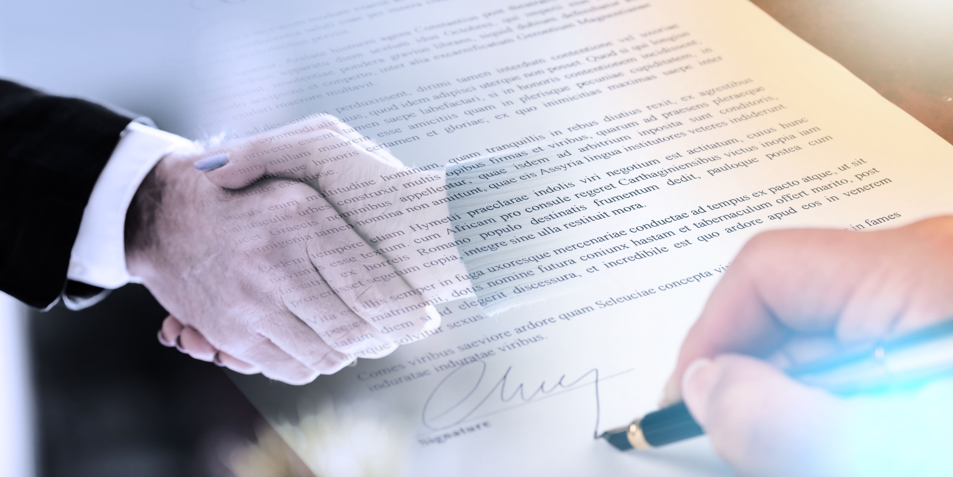 Signing IRS Form 656 offer in compromise paperwork with a California tax attorney