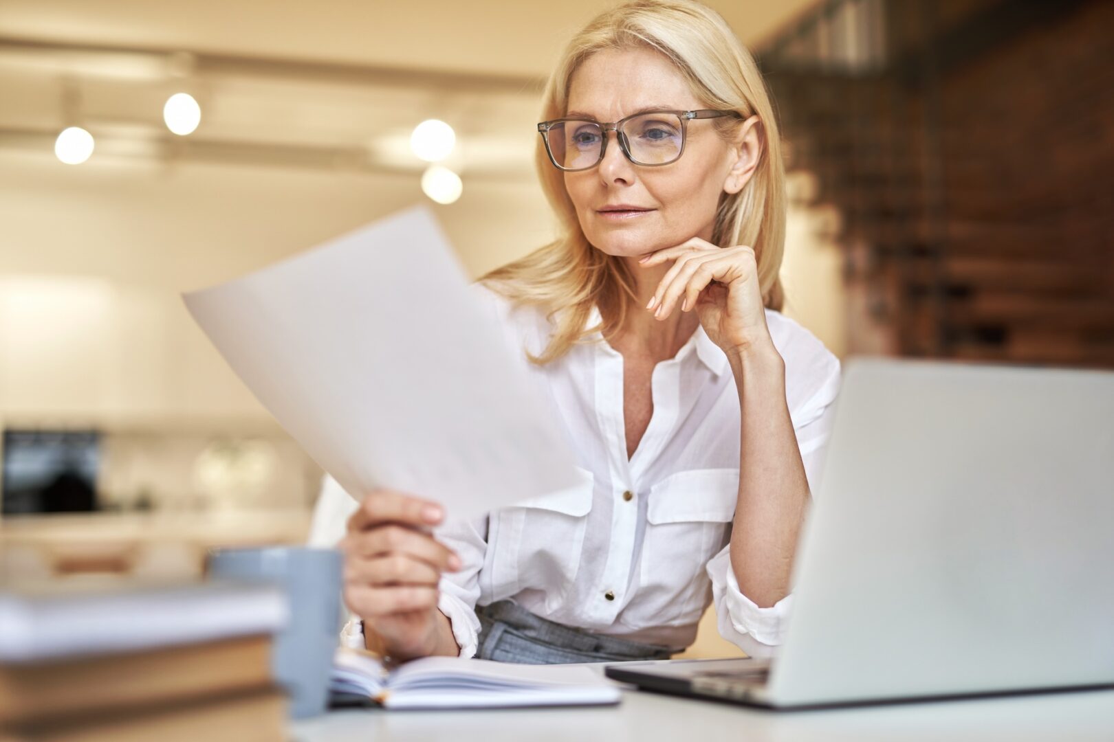 Individual taxpayer reading an IRS CP2000 notice at home Individual taxpayer reading an IRS CP2000 notice at home