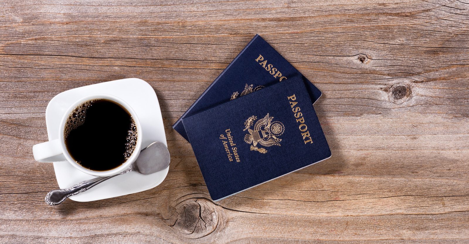 Taxpayer reviewing an IRS CP508C passport certification notice with a tax attorney Taxpayer reviewing an IRS CP508C passport certification notice with a tax attorney